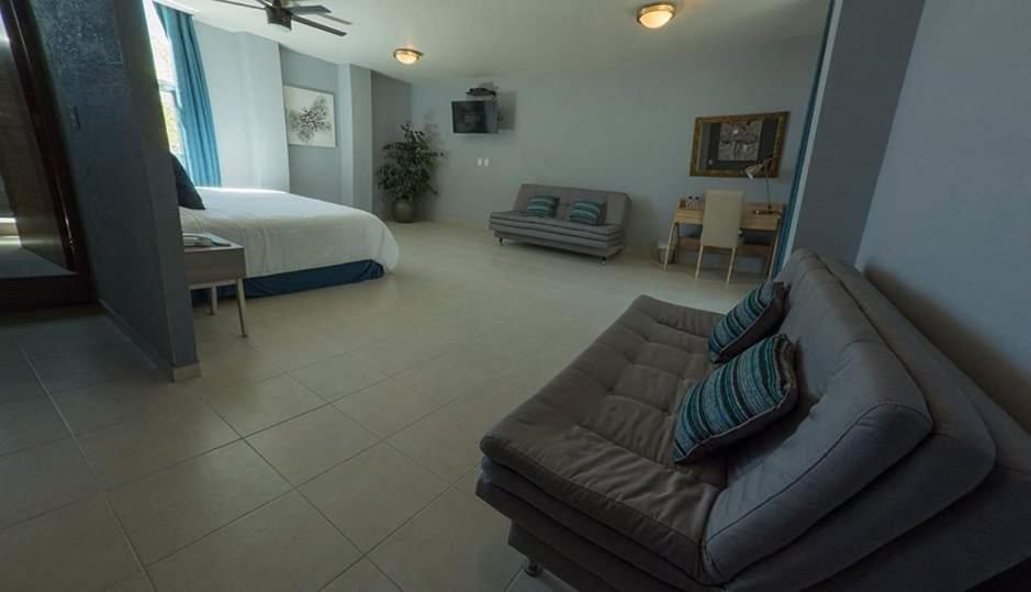 Postel nebo postele na pokoji v ubytování Hotel Siena