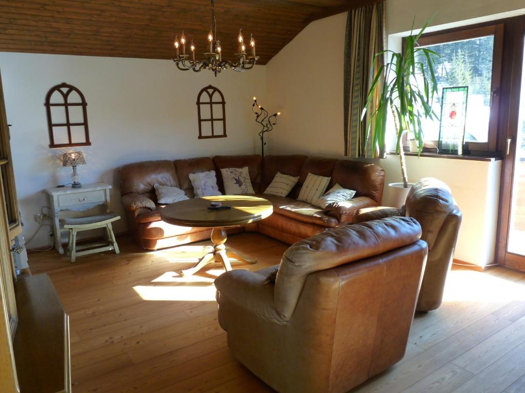 A seating area at Ferienhaus Schäfer - Apartments - Wintersports - Family holiday - Holiday with your dog - Rural & Scenic