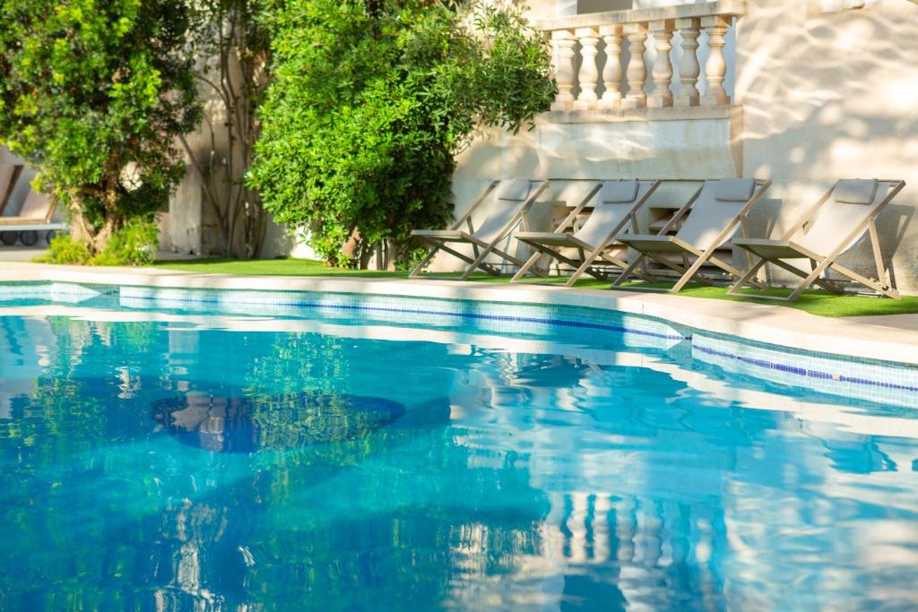 The swimming pool at or close to Es Baulo Petit Hotel