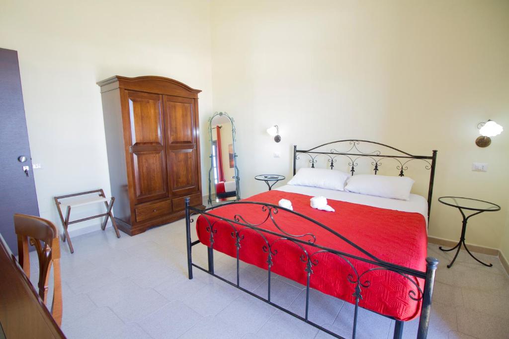 Letto o letti in una camera di Guest House Capitan Libeccio