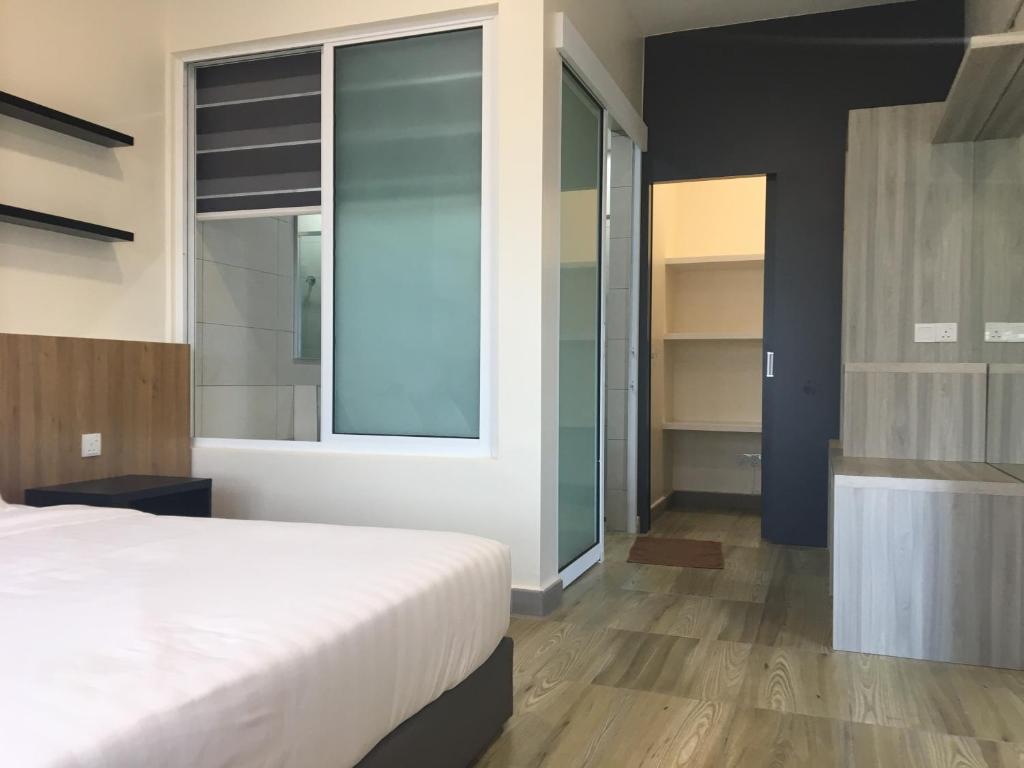Postel nebo postele na pokoji v ubytování PM Octagon Ipoh Suites & Apartment 1