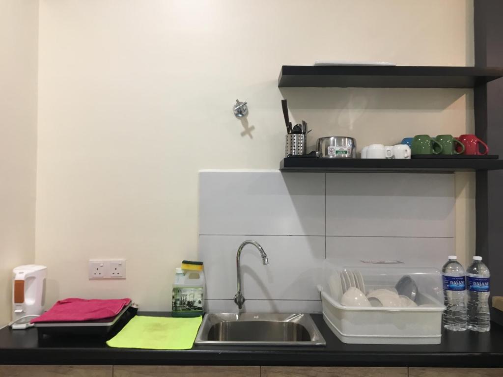 Kuchyň nebo kuchyňský kout v ubytování PM Octagon Ipoh Suites & Apartment 1