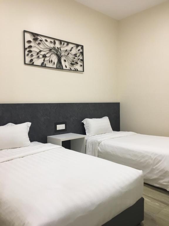 Postel nebo postele na pokoji v ubytování PM Octagon Ipoh Suites & Apartment 1