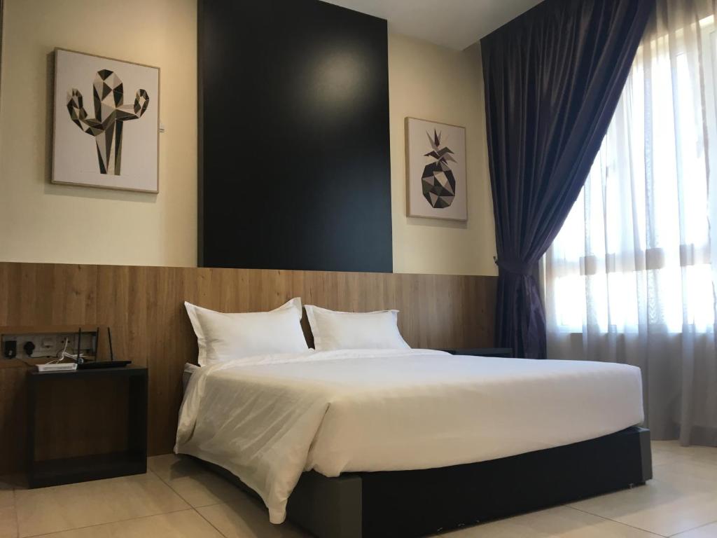 Postel nebo postele na pokoji v ubytování PM Octagon Ipoh Suites & Apartment 1
