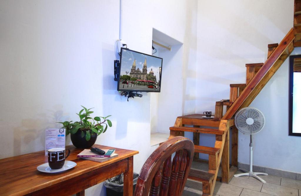 TV a/nebo společenská místnost v ubytování Hotel del Refugio