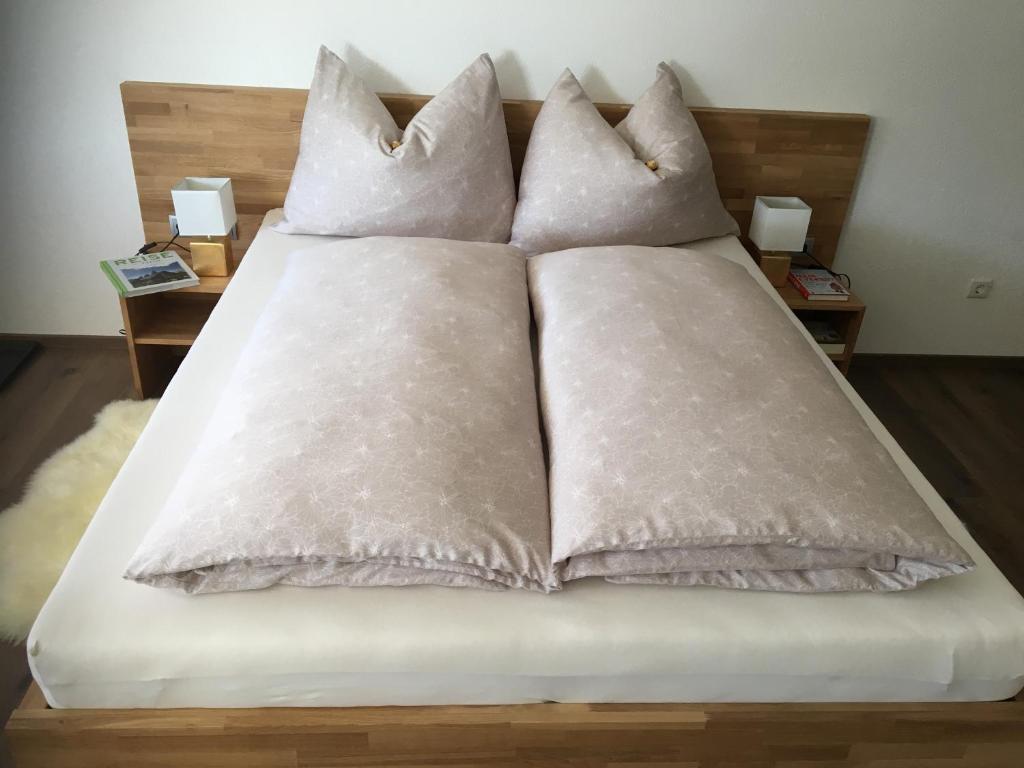 Una cama o camas en una habitaci&oacute;n de Alpapart - Innsbruck