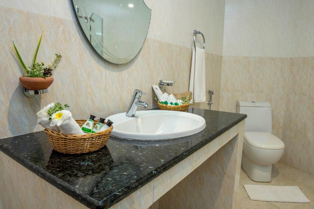 Koupelna v ubytování Hotel Sudu Araliya