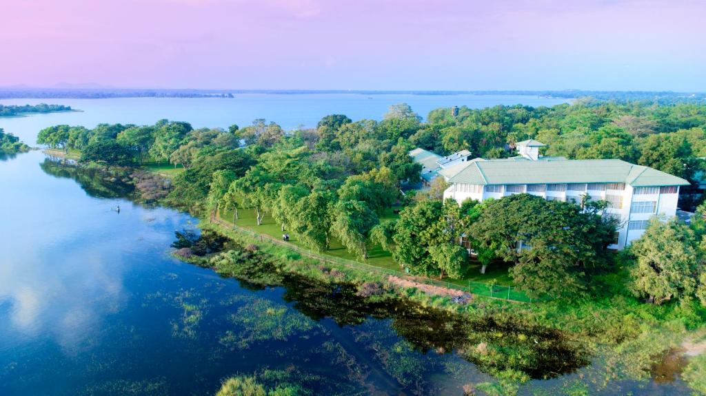 an aerial view of a building next to a river at Hotel Sudu Araliya in Polonnaruwa