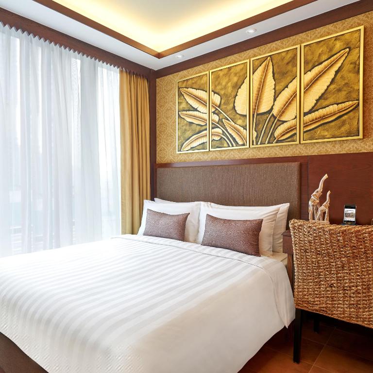 Postel nebo postele na pokoji v ubytování Hotel COZi Resort Tuen Mun