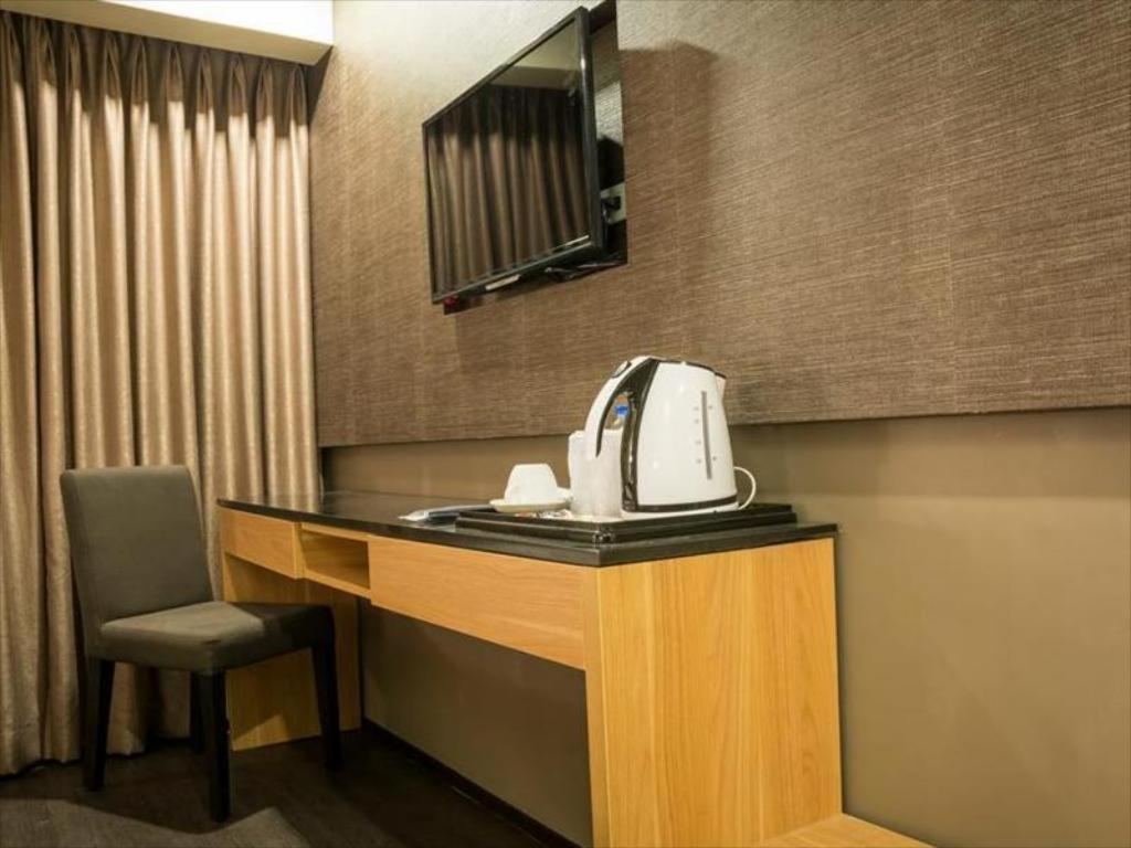 Kuchyň nebo kuchyňský kout v ubytování GT Hotel Iloilo