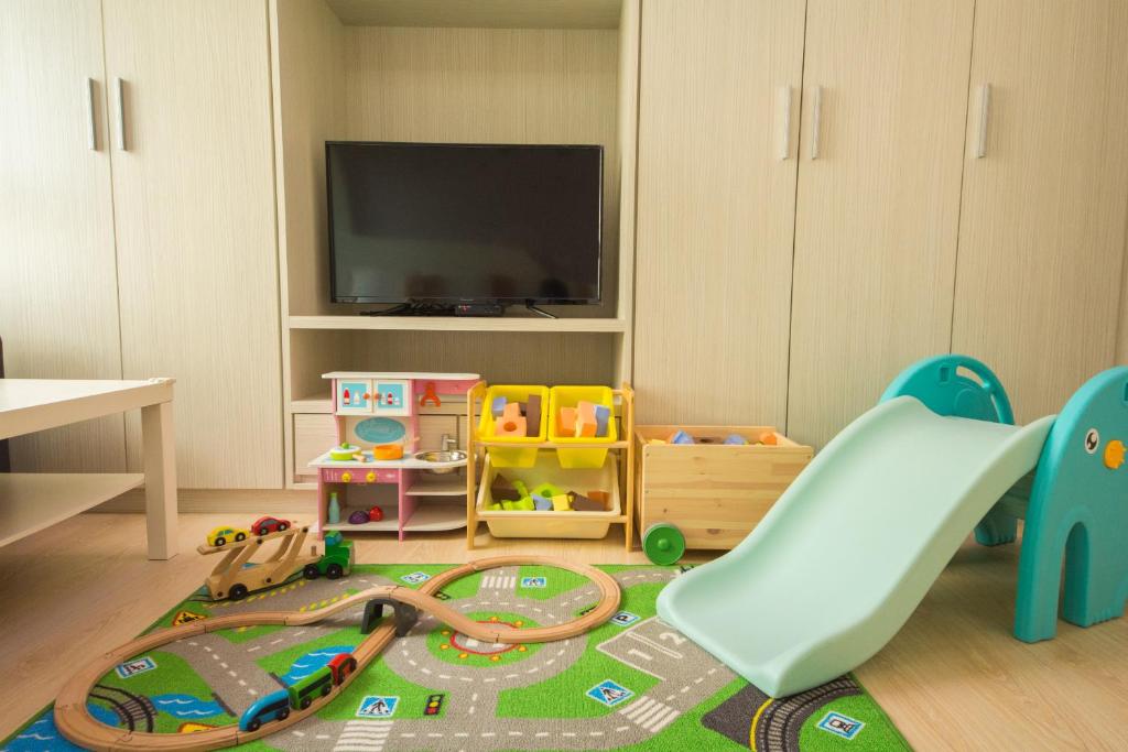 Sjónvarps- og/eða afþreyingartæki á Childlike B&B
