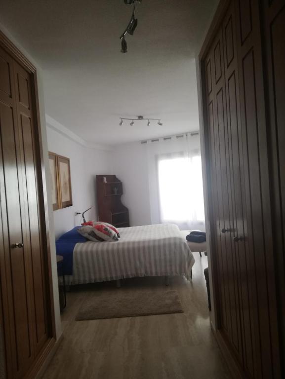Postel nebo postele na pokoji v ubytování Apartamento Alba