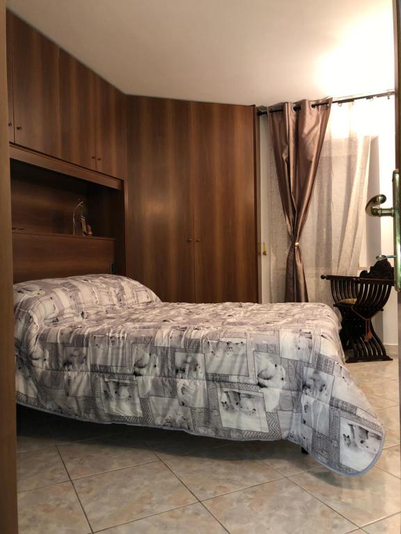 เตียงในห้องที่ La Residenza dei Papi