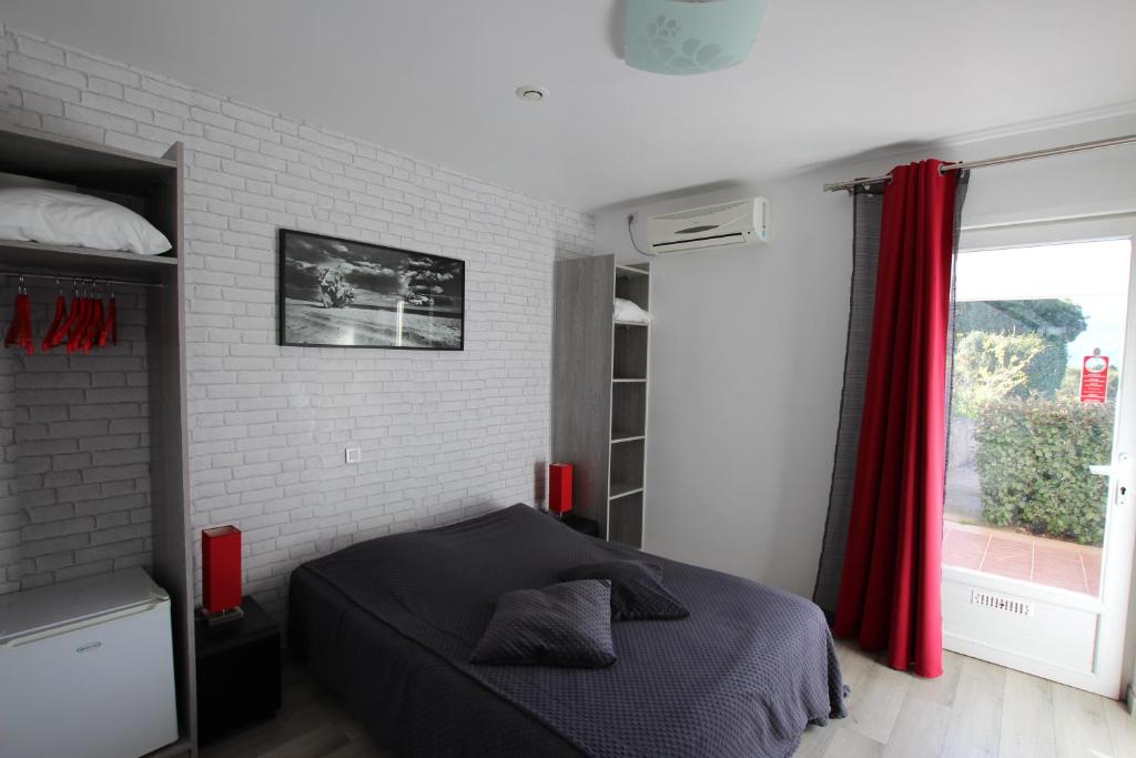 Postel nebo postele na pokoji v ubytování Hôtel "U Nebbiu"