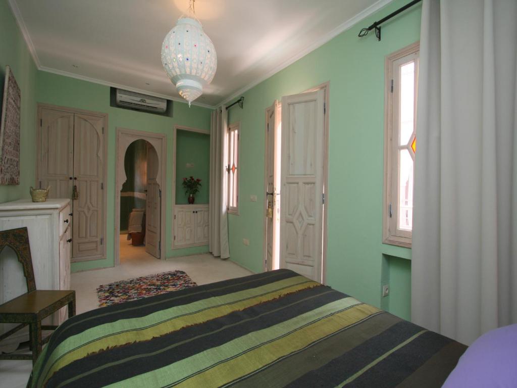 Postel nebo postele na pokoji v ubytování Riad Tahani