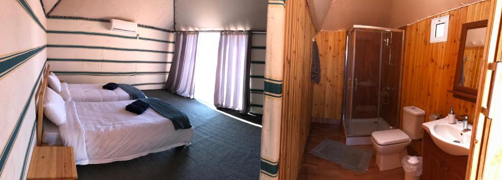 Postel nebo postele na pokoji v ubytování Wadi Rum Camp