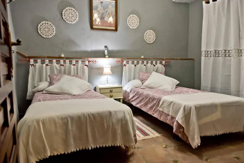 Postel nebo postele na pokoji v ubytování LA POSADA
