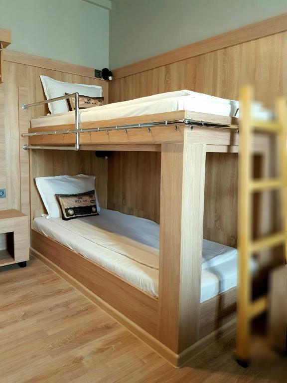 Postel nebo postele na pokoji v ubytování Hotel Allur
