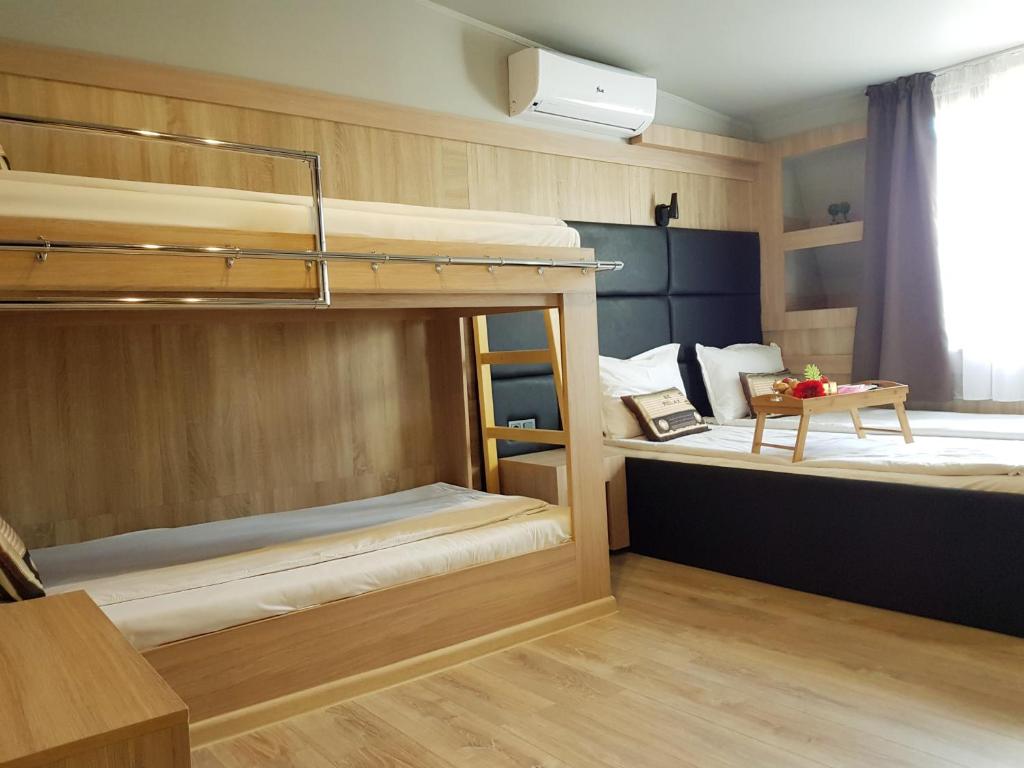 Postel nebo postele na pokoji v ubytování Hotel Allur