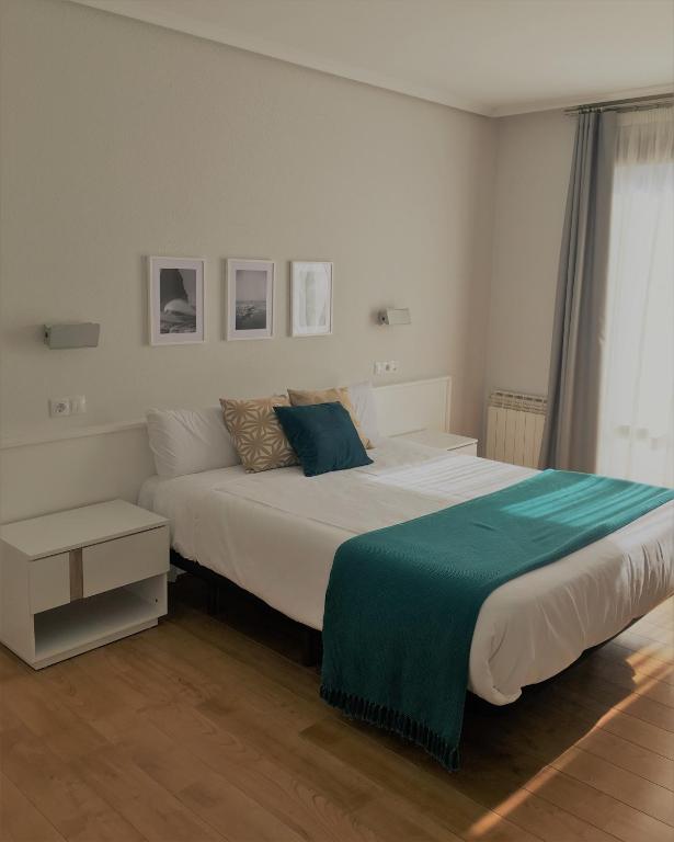 Postel nebo postele na pokoji v ubytování Hotel Elorrio