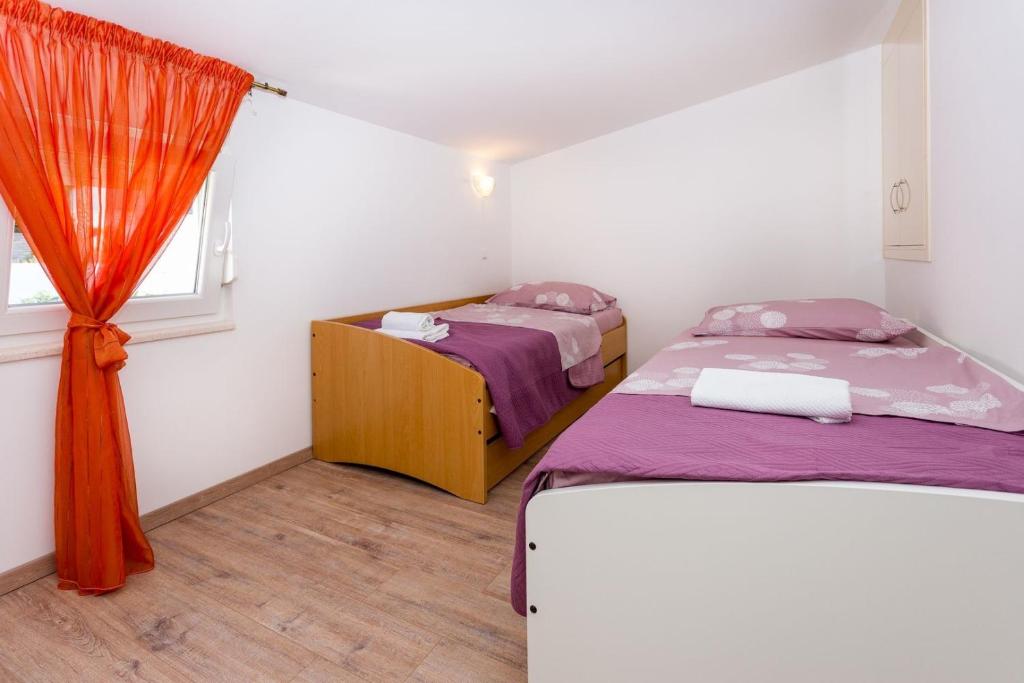 Posteľ alebo postele v izbe v ubytovaní Villa Duce in Omis, private pool