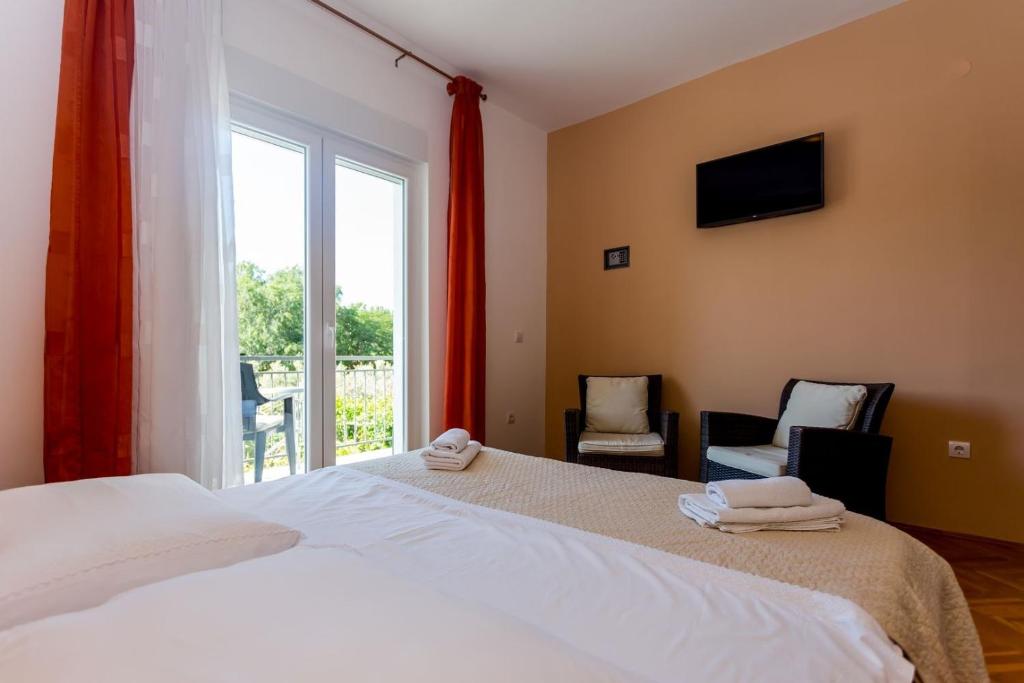 Posteľ alebo postele v izbe v ubytovaní Villa Duce in Omis, private pool