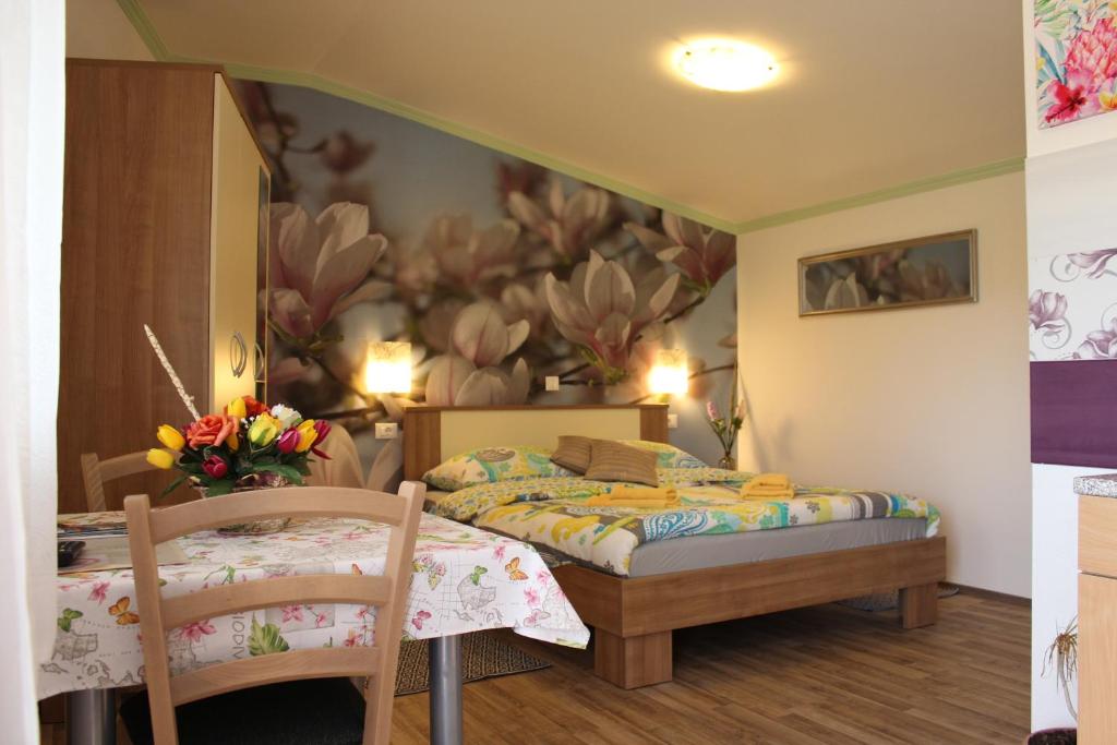 Postel nebo postele na pokoji v ubytování Rooms Katarina