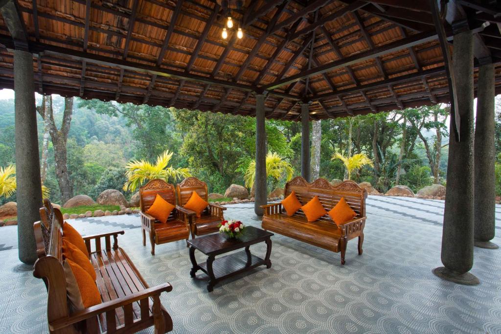 Posezení v ubytování Spices Lap, Thekkady