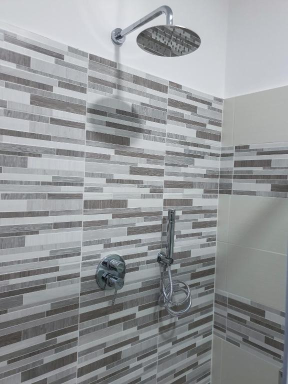 Koupelna v ubytování Giò Rooms