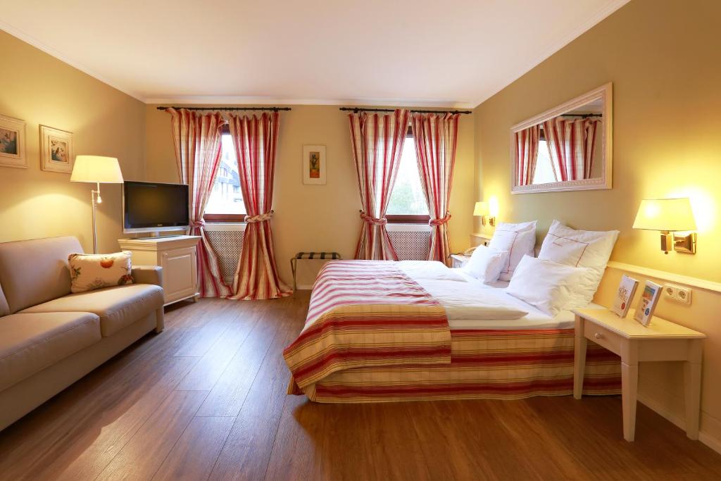 Ein Bett oder Betten in einem Zimmer der Unterkunft Blesius Garten