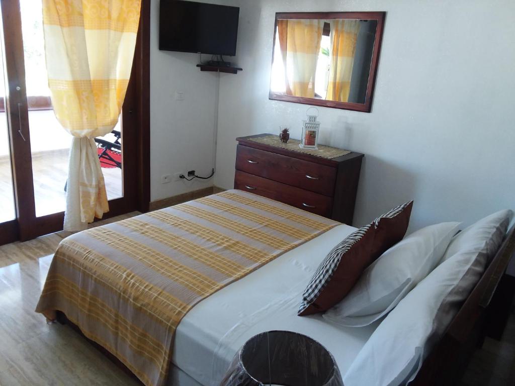Postel nebo postele na pokoji v ubytování Oasi Encantada - Beach Resort