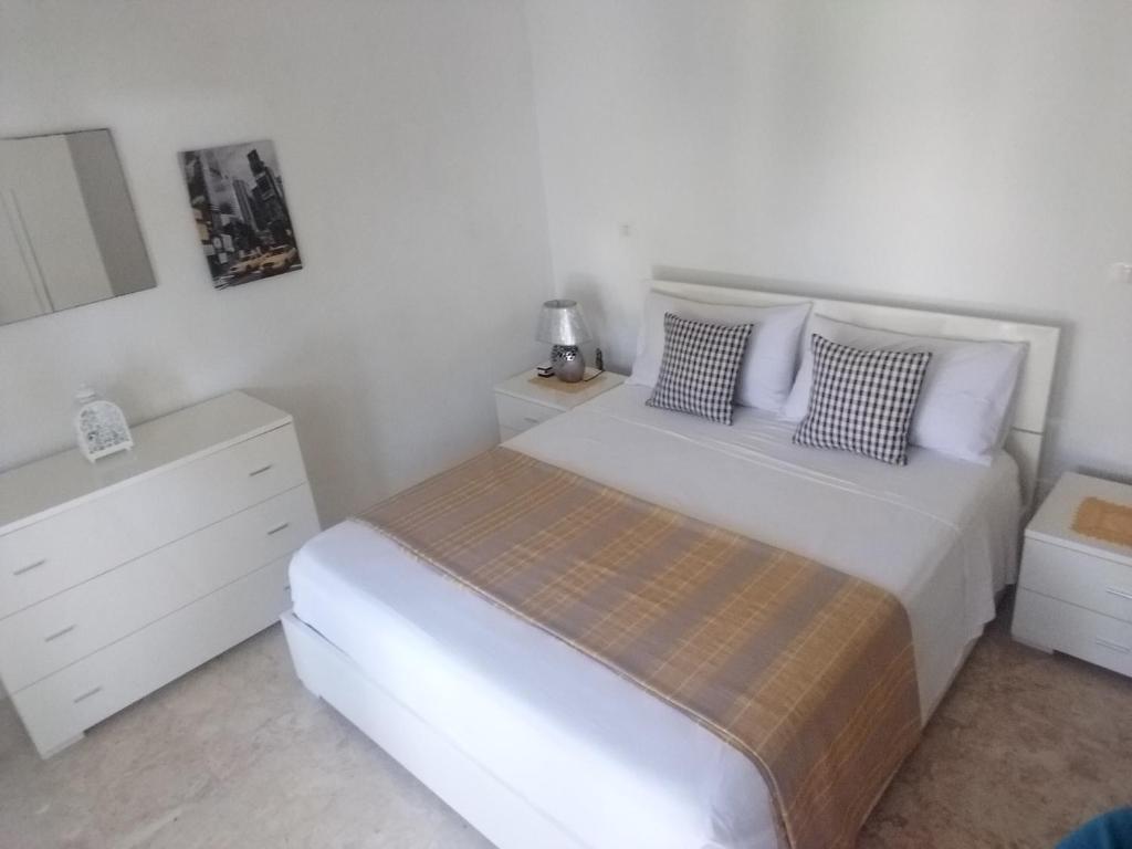 Postel nebo postele na pokoji v ubytování Oasi Encantada - Beach Resort