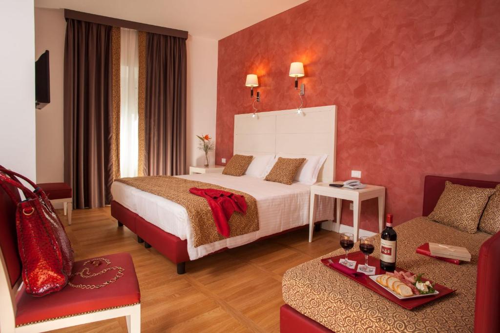Postel nebo postele na pokoji v ubytování Floris Hotel