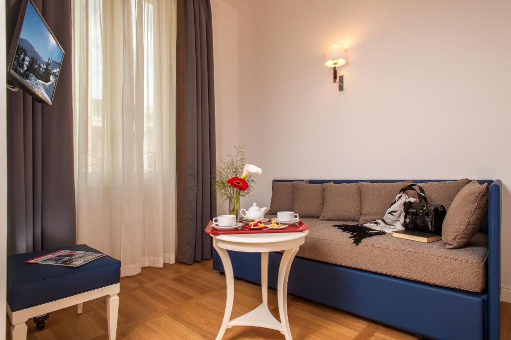 Posezení v ubytování Floris Hotel