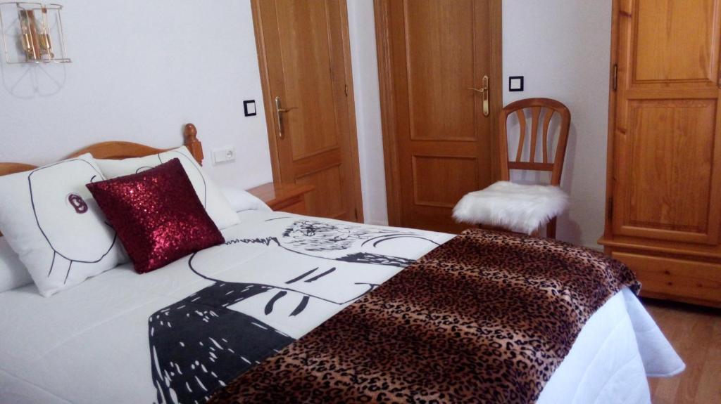 Postel nebo postele na pokoji v ubytování Hostal "Los Chanos el Ruso"