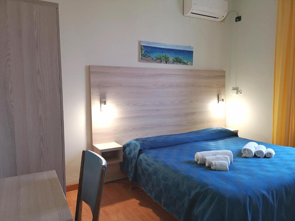 Postel nebo postele na pokoji v ubytování Hotel Villa La Brise
