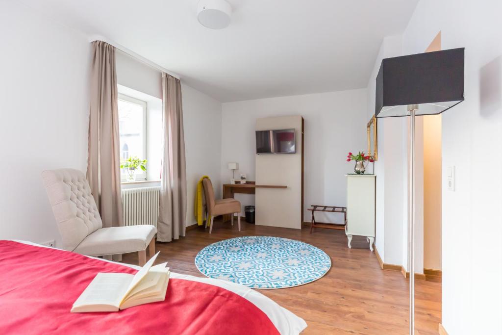 TV a/nebo společenská místnost v ubytování Hotel Vorderburg