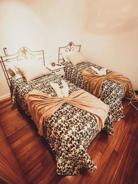 Postel nebo postele na pokoji v ubytování Azenha do Tio Luís