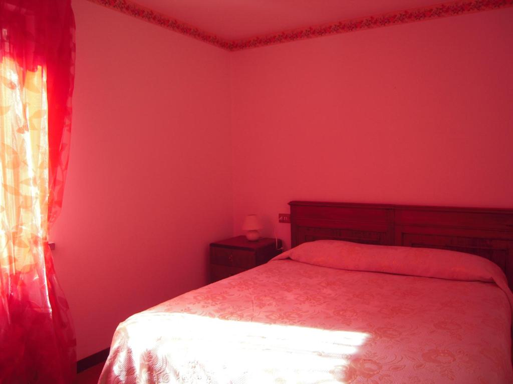 Postel nebo postele na pokoji v ubytování Uliveto