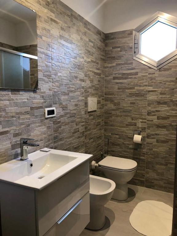 A bathroom at Hotel Delle Rose