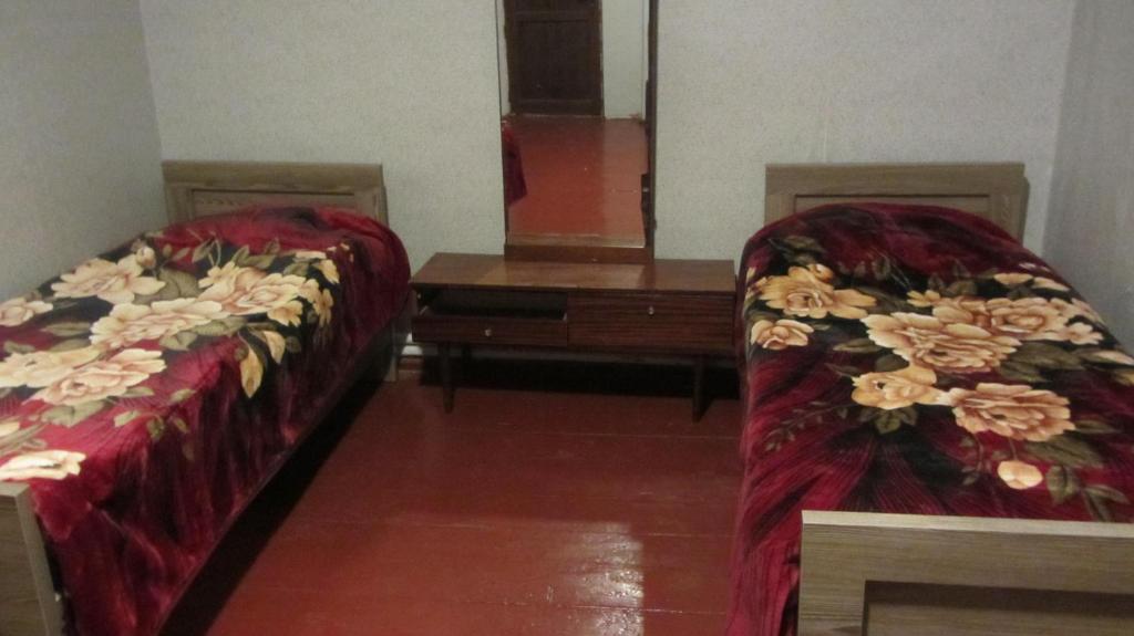 Postel nebo postele na pokoji v ubytování Guest House Adelina