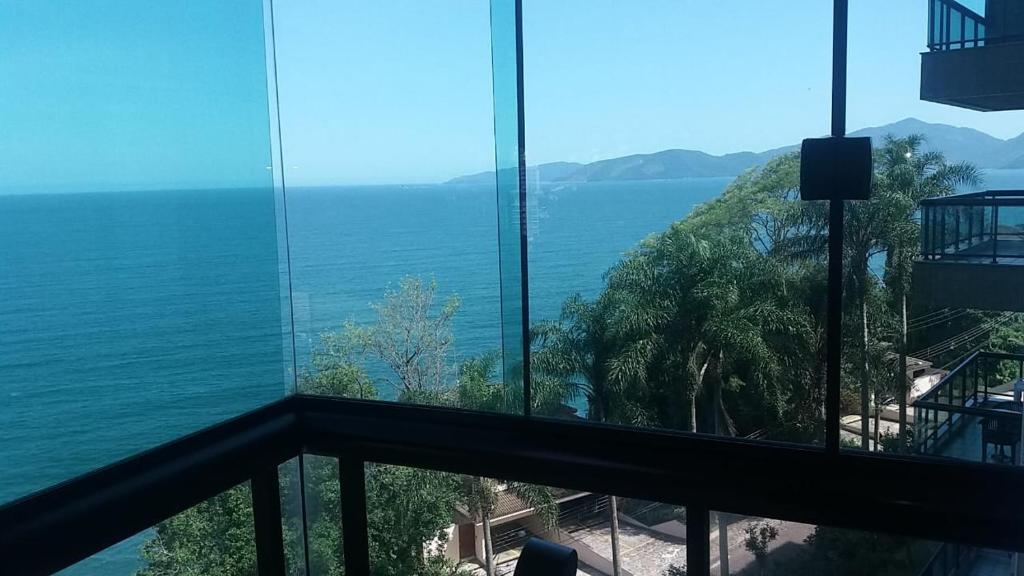 a view of the ocean from a building at Apartamento no Porto Real Resort com vista para o mar in Mangaratiba