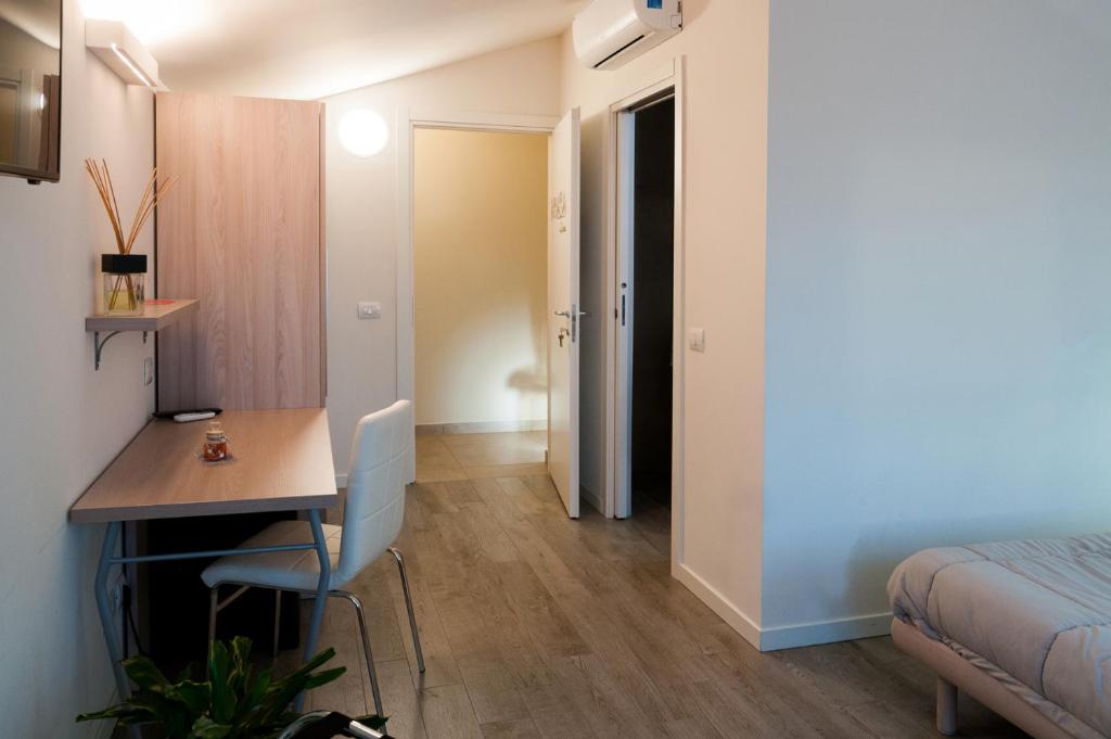Postel nebo postele na pokoji v ubytování VILLA FENIX OSIO SOTTO