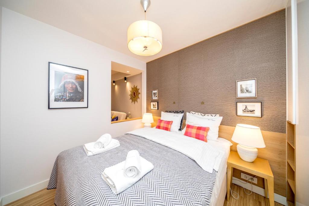 Posteľ alebo postele v izbe v ubytovaní Golden Apartment with Air Condition by Your Freedom