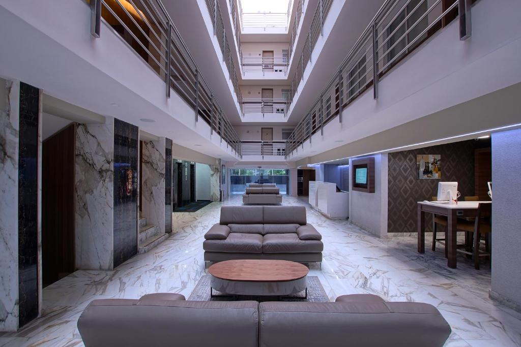 Posezení v ubytování Econo Express Hotel