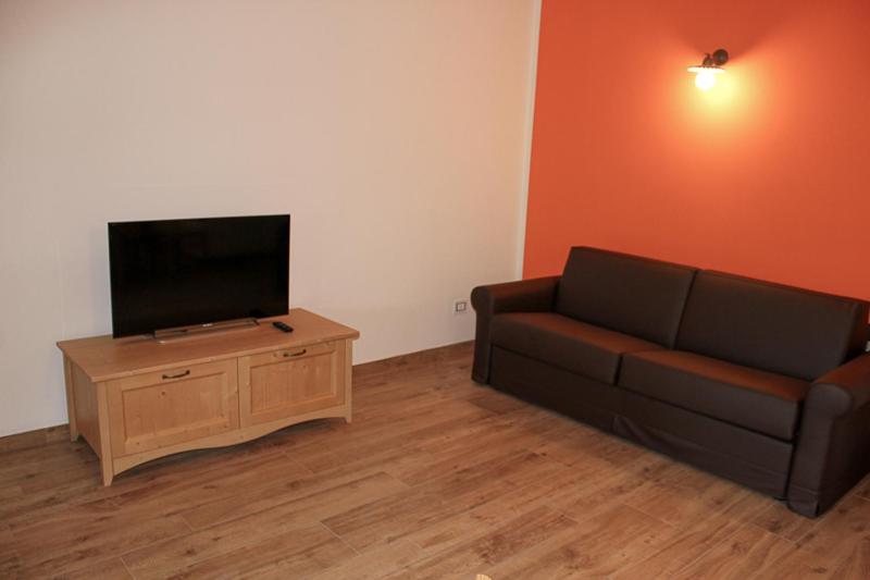 TV a/nebo společenská místnost v ubytování Residence Elettra