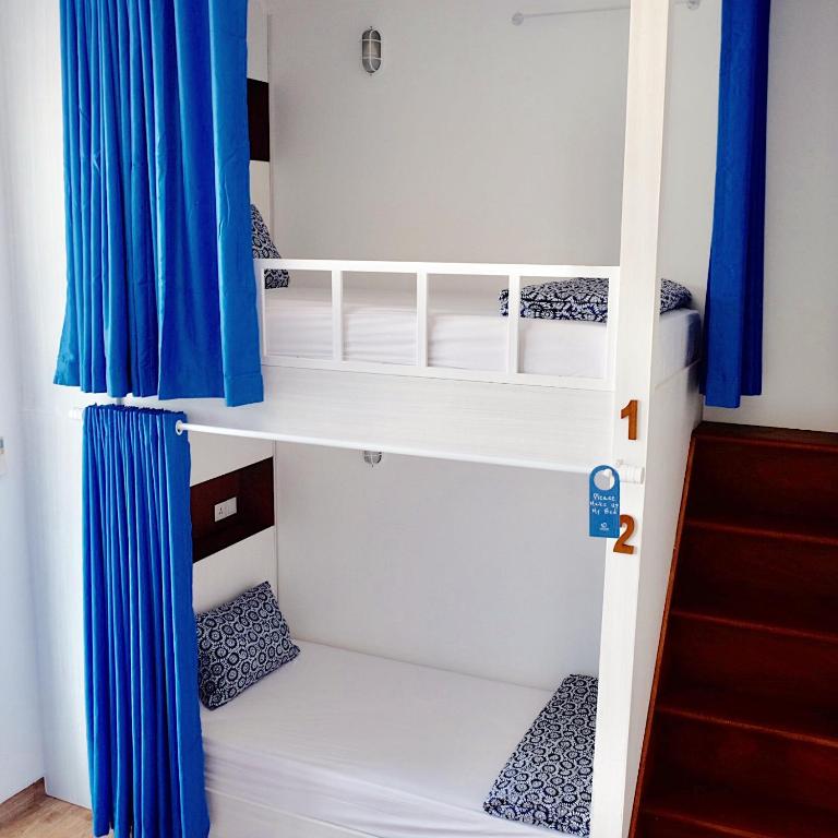 Postel nebo postele na pokoji v ubytování Dip & Doze Living