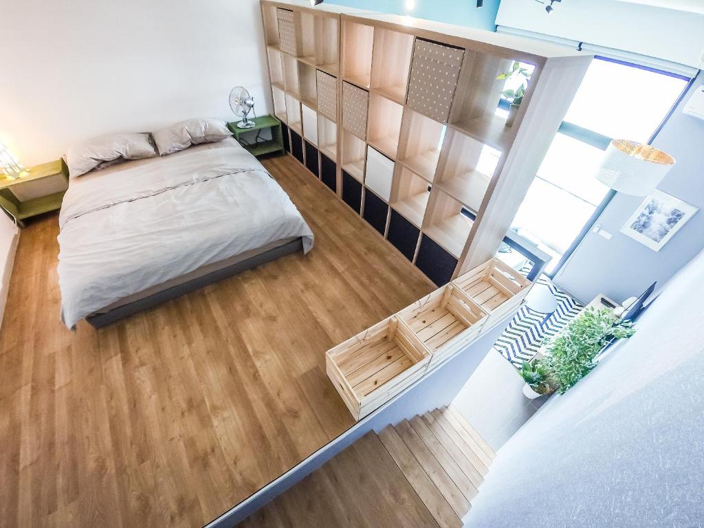Postel nebo postele na pokoji v ubytování EST Suites Bangsar by Airhost