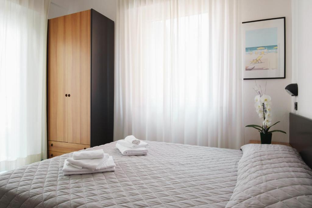 Postel nebo postele na pokoji v ubytování Hotel St Pierre