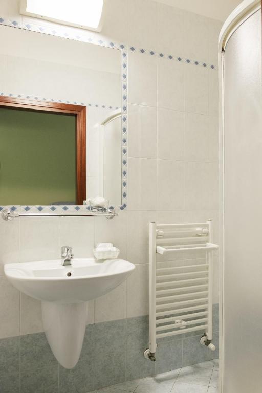 Koupelna v ubytování Hotel St Pierre